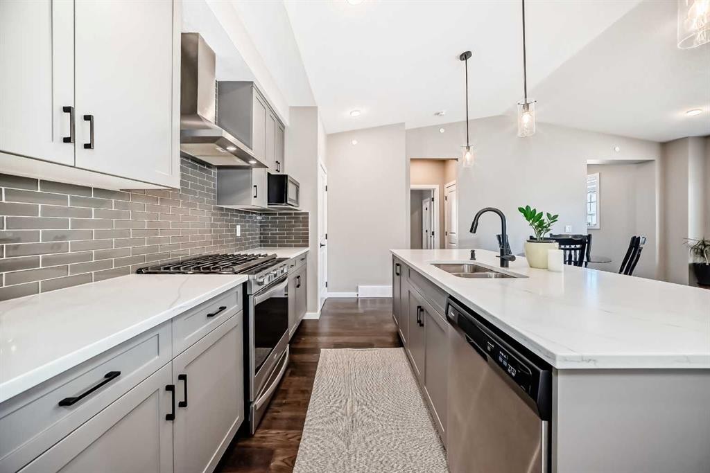 241 Lucas Avenue Nw, Calgary, AB - Indoor Photo Showing Kitchen With Double Sink With Upgraded Kitchen