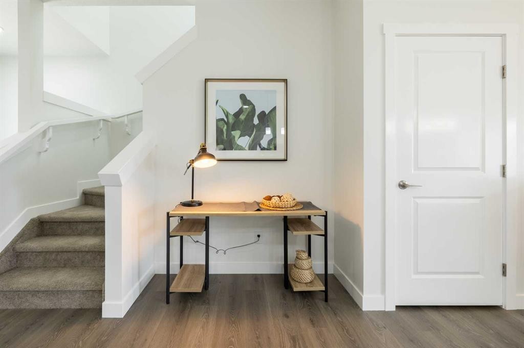 71 Heritage Manor, Cochrane, AB - Indoor Photo Showing Other Room