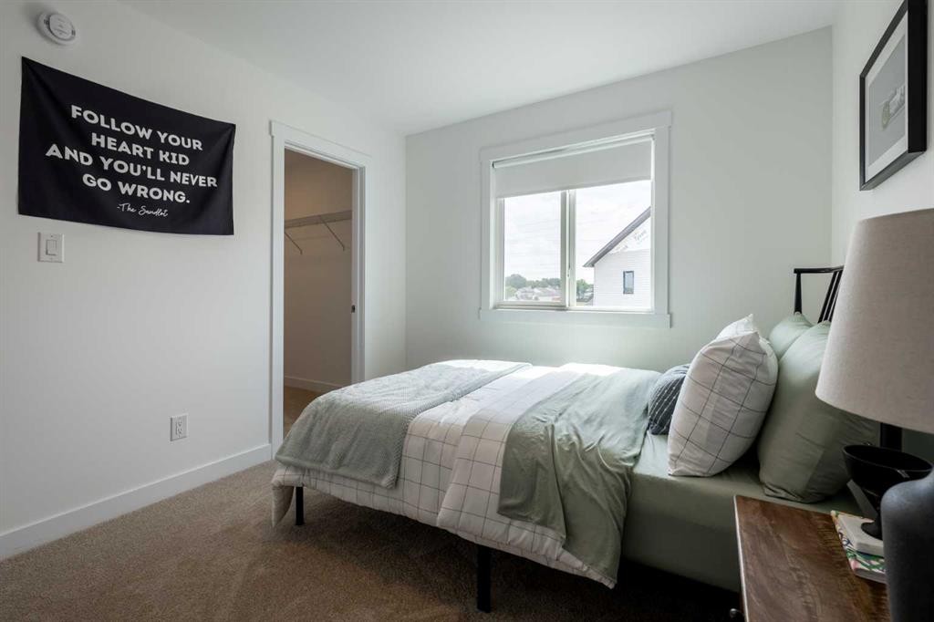 506 Ranch Green, Strathmore, AB - Indoor Photo Showing Bedroom