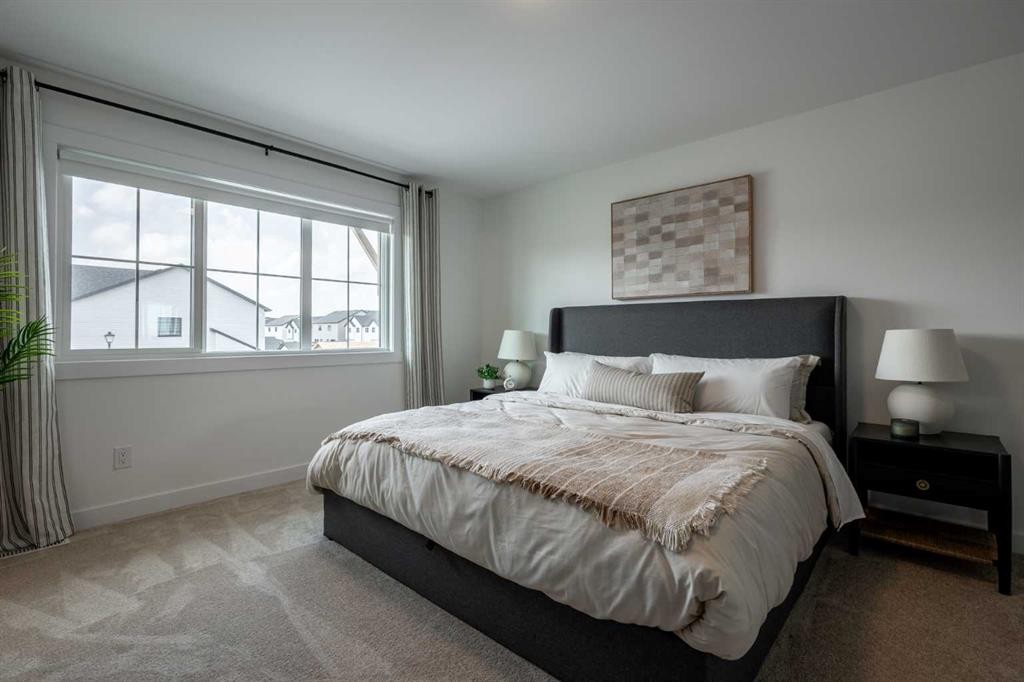 506 Ranch Green, Strathmore, AB - Indoor Photo Showing Bedroom