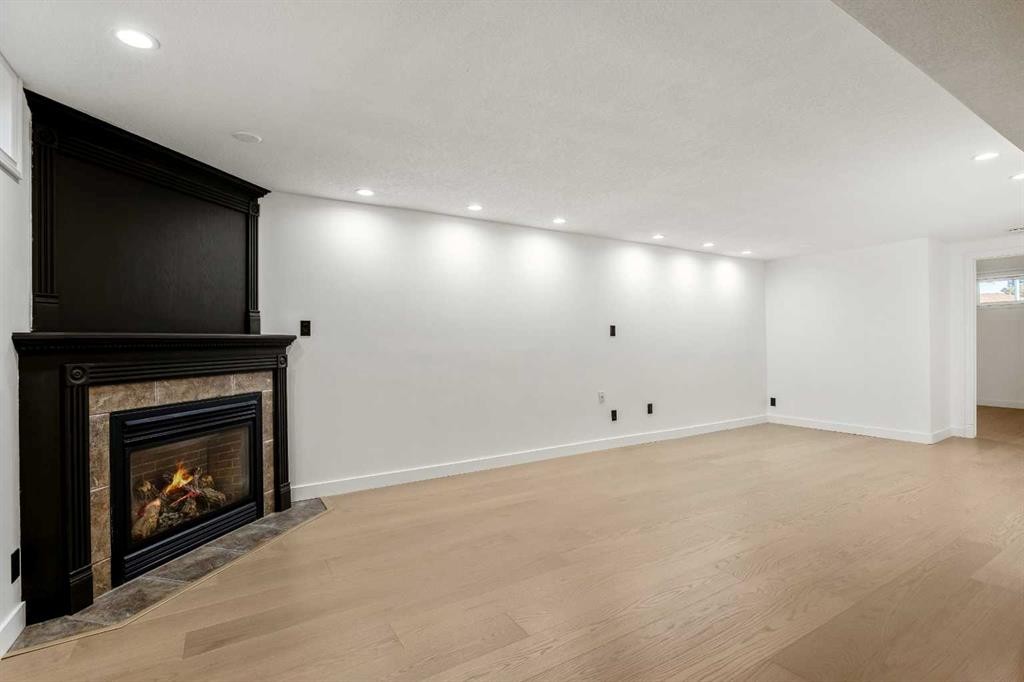 4703 40 Avenue Sw, Calgary, AB - Indoor With Fireplace