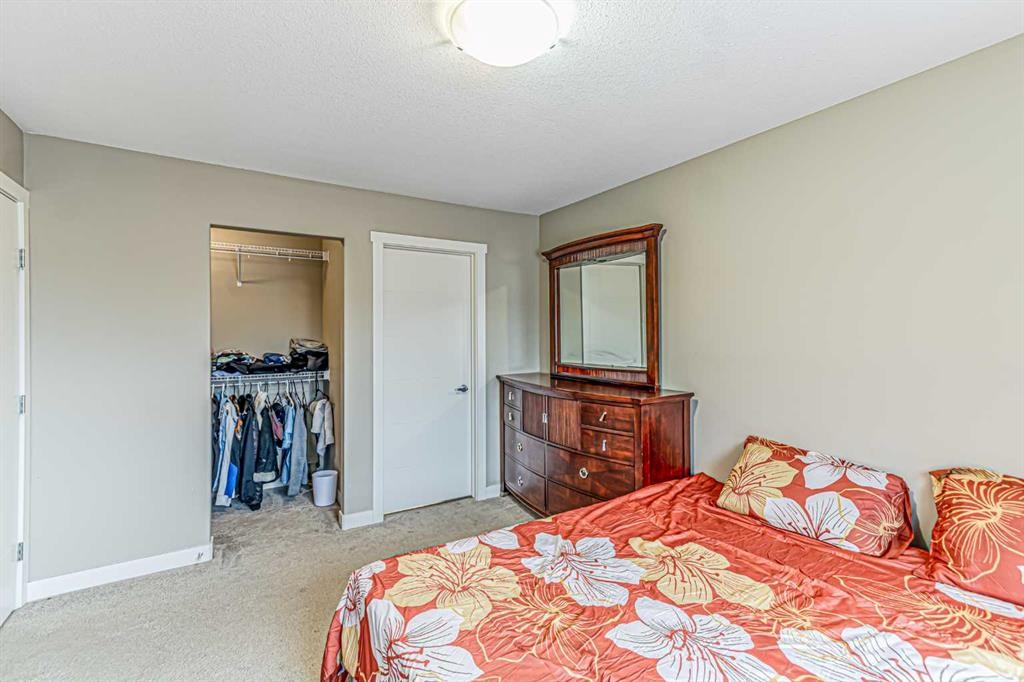 535 Redstone View Ne, Calgary, AB - Indoor Photo Showing Bedroom