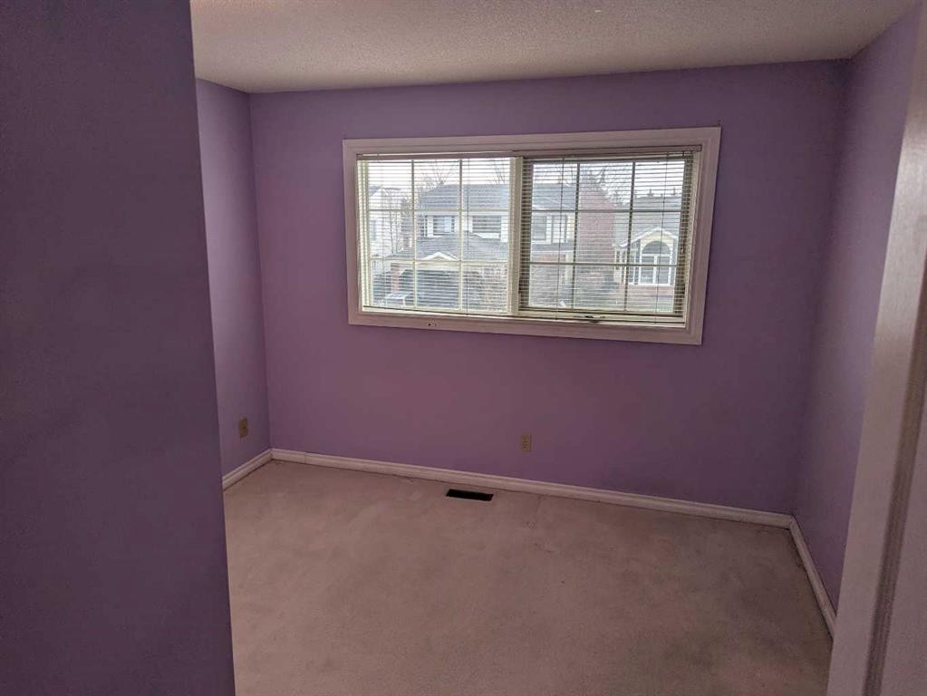 165 Woodford Drive Sw, Calgary, AB - Indoor Photo Showing Other Room