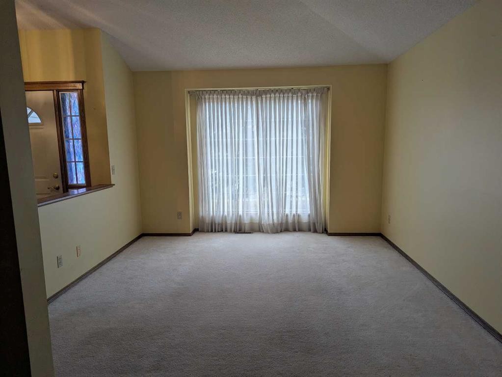 165 Woodford Drive Sw, Calgary, AB - Indoor Photo Showing Other Room
