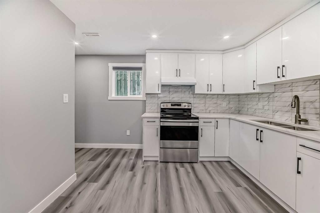 110 Falmere Way Ne, Calgary, AB - Indoor Photo Showing Kitchen With Double Sink