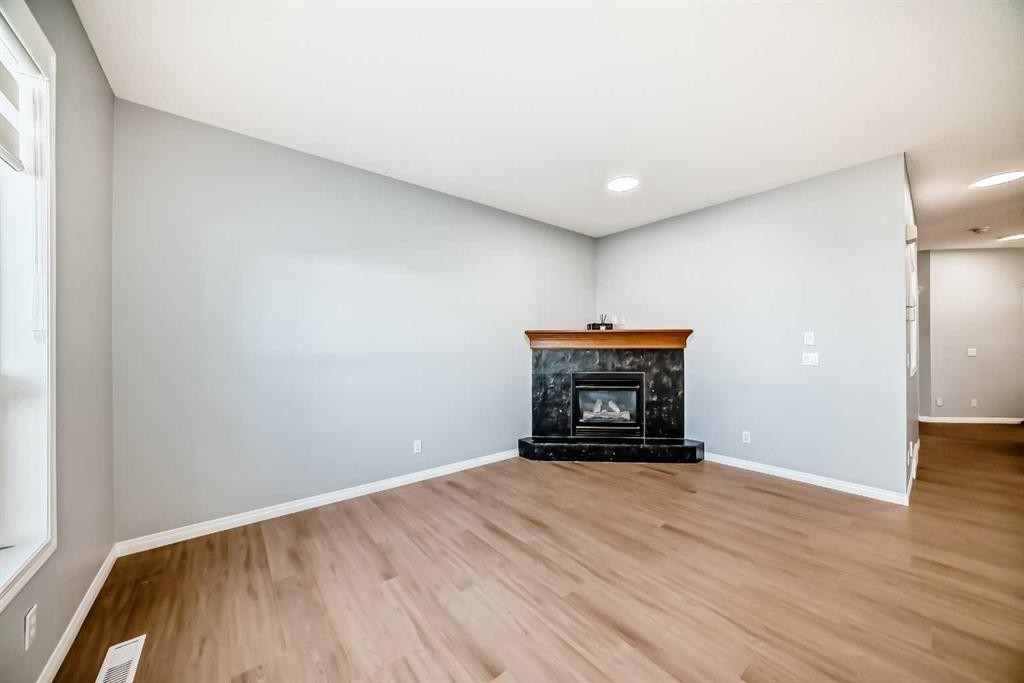 234 Millview Gardens Sw, Calgary, AB - Indoor Photo Showing Other Room With Fireplace