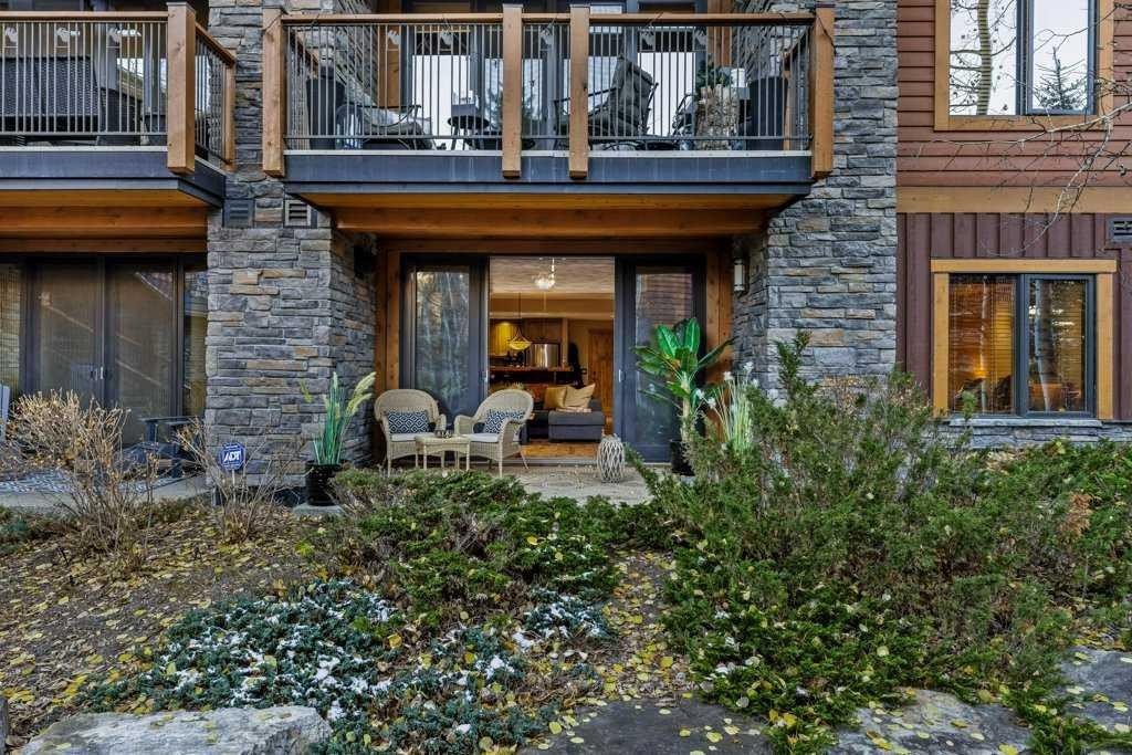 2107-101B Stewart Creek Landing, Canmore, AB - Outdoor With Deck Patio Veranda