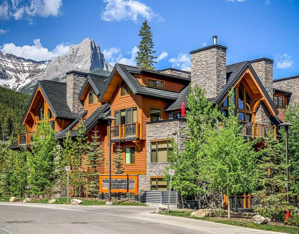2107-101B Stewart Creek Landing, Canmore, AB - Outdoor With Facade