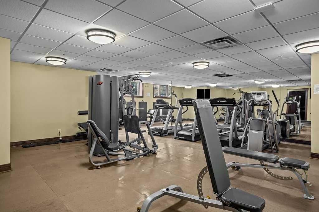 2107-101B Stewart Creek Landing, Canmore, AB - Indoor Photo Showing Gym Room