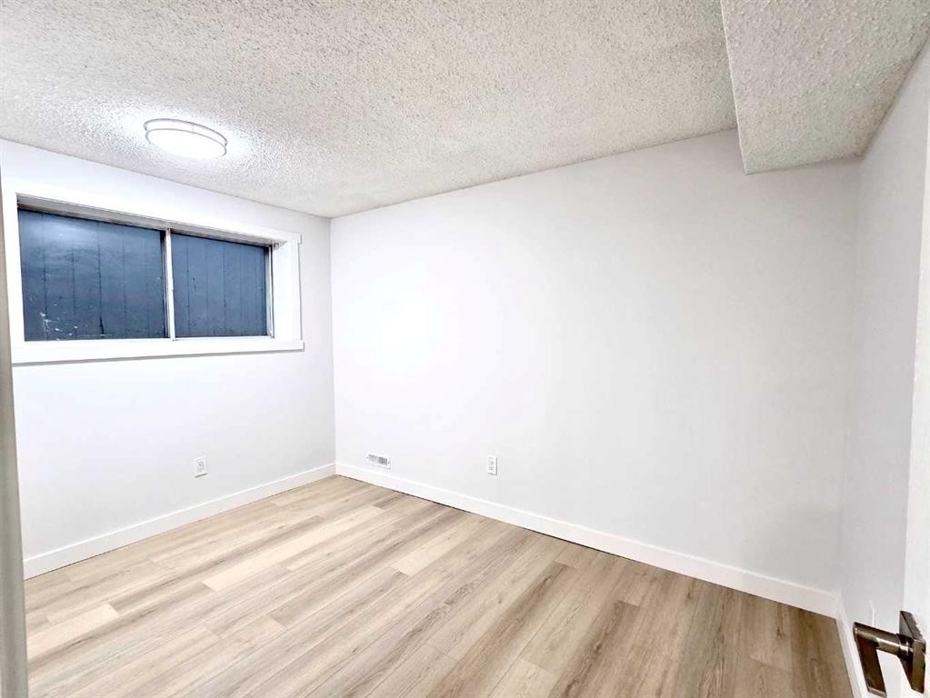 131 Whiteview Close Ne, Calgary, AB - Indoor Photo Showing Other Room