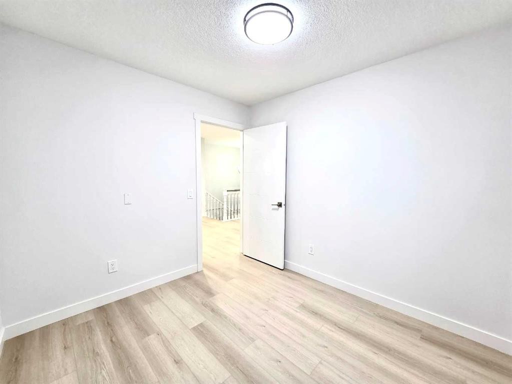131 Whiteview Close Ne, Calgary, AB - Indoor Photo Showing Other Room