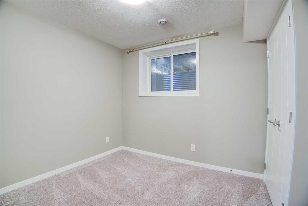 198 Masters Avenue Se, Calgary, AB - Indoor Photo Showing Other Room