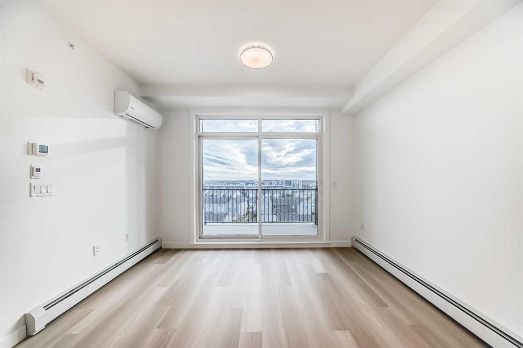 1411-430 Sage Hill Road Nw, Calgary, AB - Indoor Photo Showing Other Room