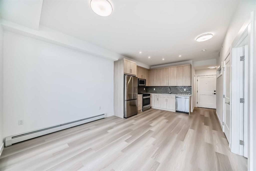 1411-430 Sage Hill Road Nw, Calgary, AB - Indoor Photo Showing Kitchen
