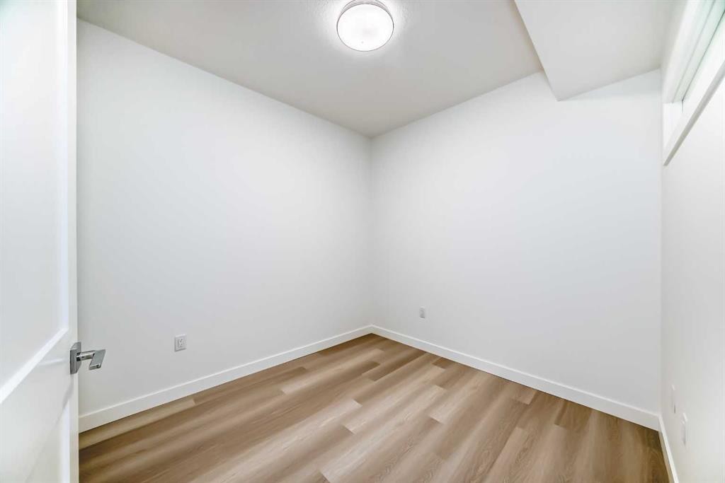 1411-430 Sage Hill Road Nw, Calgary, AB - Indoor Photo Showing Other Room