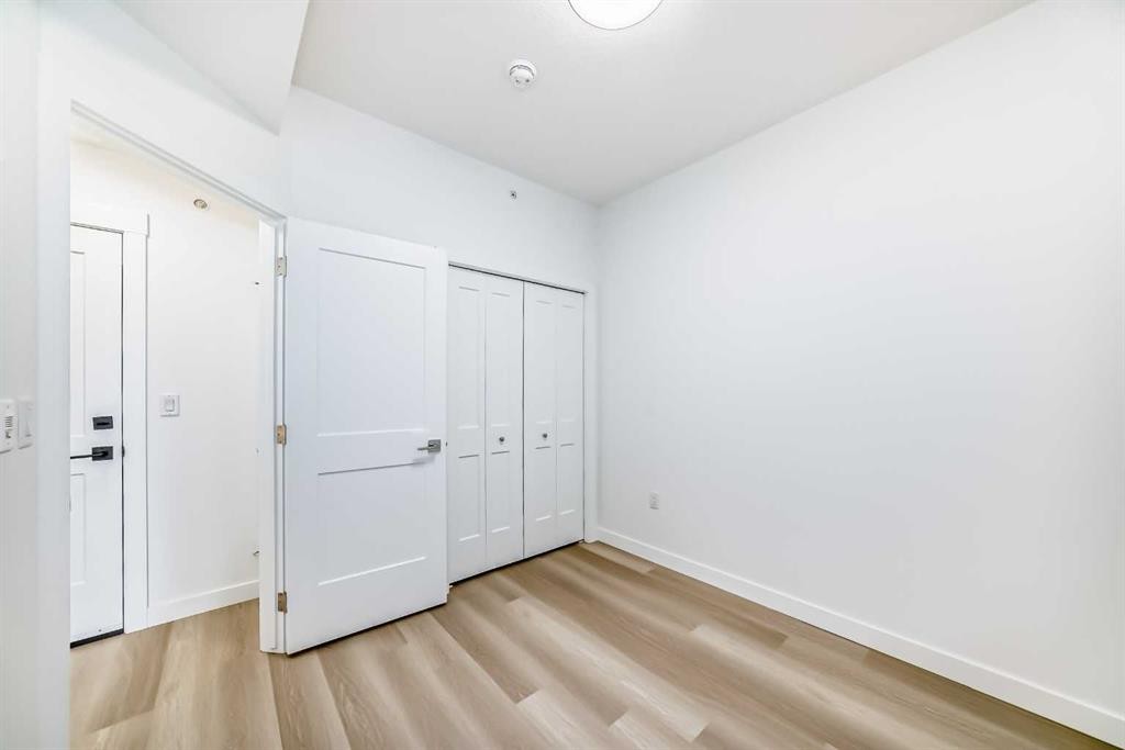 1411-430 Sage Hill Road Nw, Calgary, AB - Indoor Photo Showing Other Room