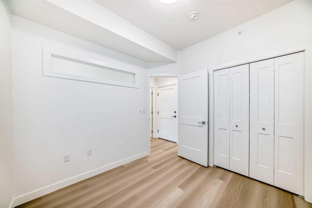 1411-430 Sage Hill Road Nw, Calgary, AB - Indoor Photo Showing Other Room