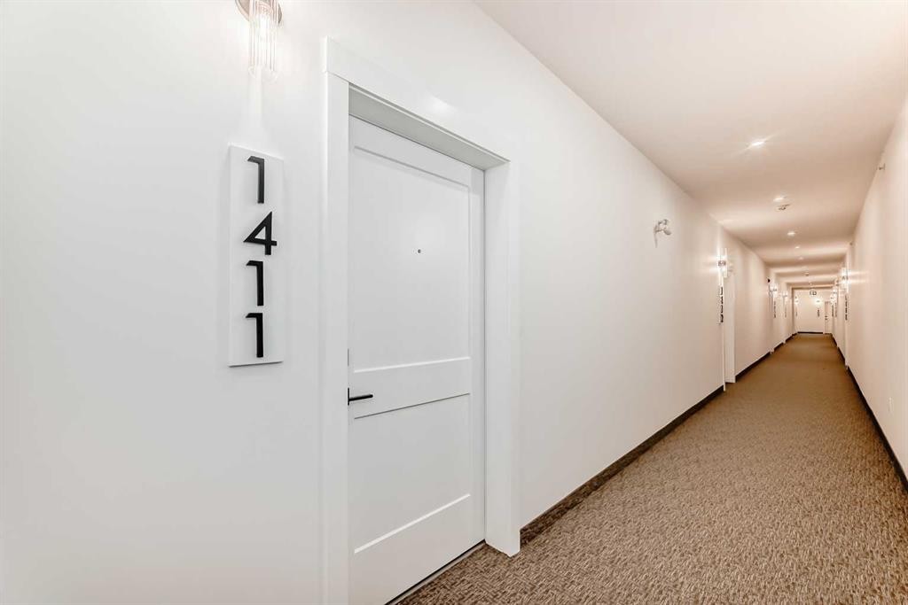 1411-430 Sage Hill Road Nw, Calgary, AB - Indoor Photo Showing Other Room