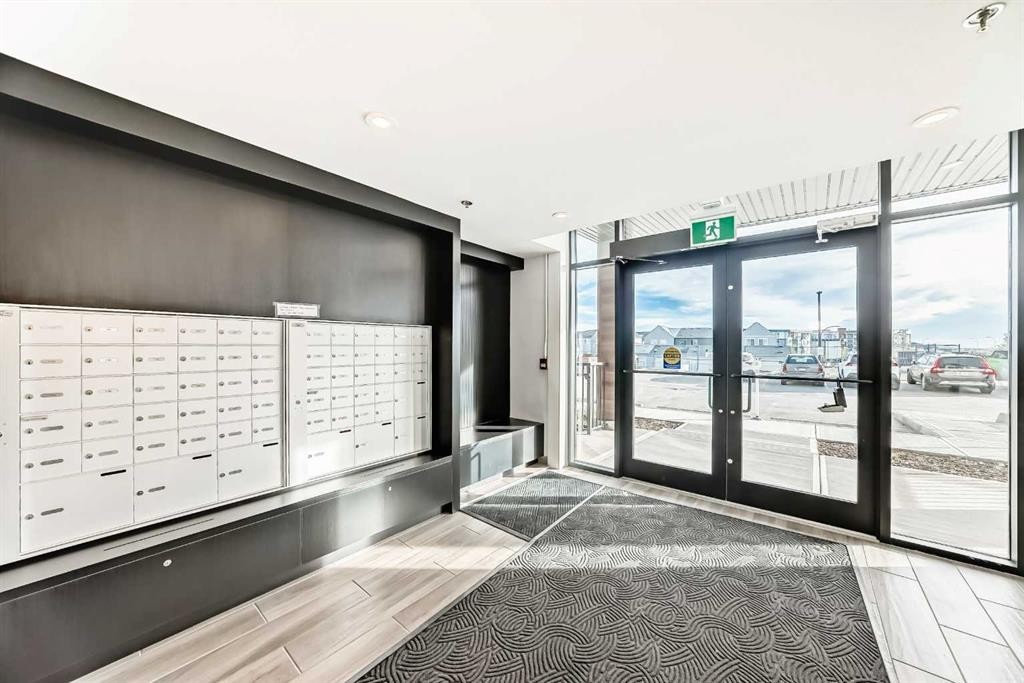 1411-430 Sage Hill Road Nw, Calgary, AB - Indoor Photo Showing Other Room