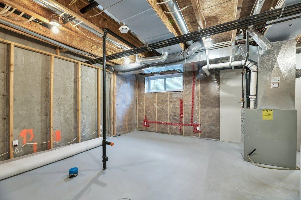 65 Marine Drive Se, Calgary, AB - Indoor Photo Showing Basement