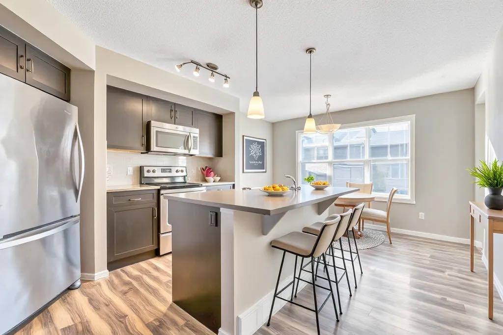 65 Marine Drive Se, Calgary, AB - Indoor Photo Showing Kitchen With Stainless Steel Kitchen With Upgraded Kitchen