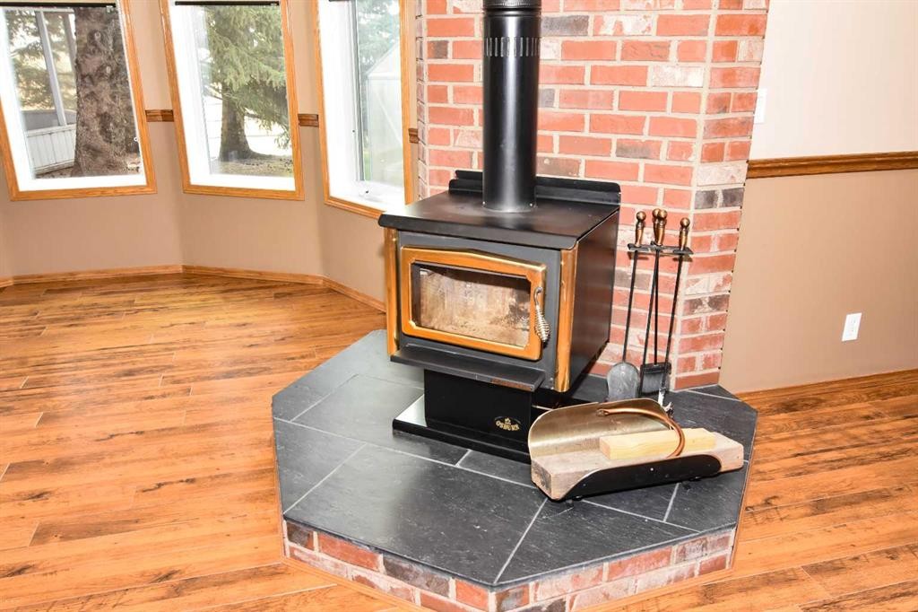 272166 Panorama Road, Rural Rocky View County, AB - Indoor Photo Showing Other Room With Fireplace