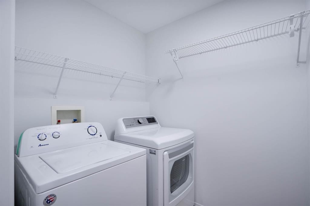 382 Brightonstone Green Se, Calgary, AB - Indoor Photo Showing Laundry Room