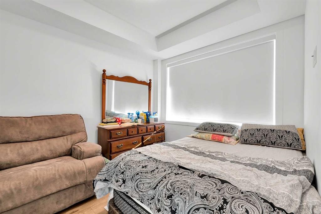 1415-111 Wolf Creek Drive Se, Calgary, AB - Indoor Photo Showing Bedroom
