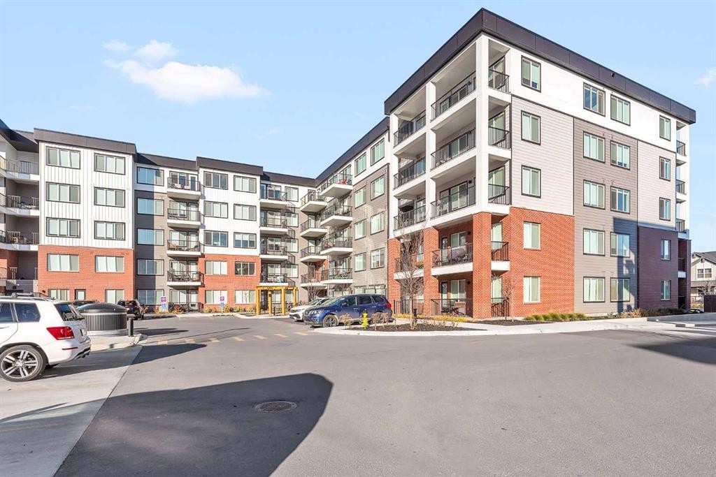 1415-111 Wolf Creek Drive Se, Calgary, AB - Outdoor With Balcony With Facade