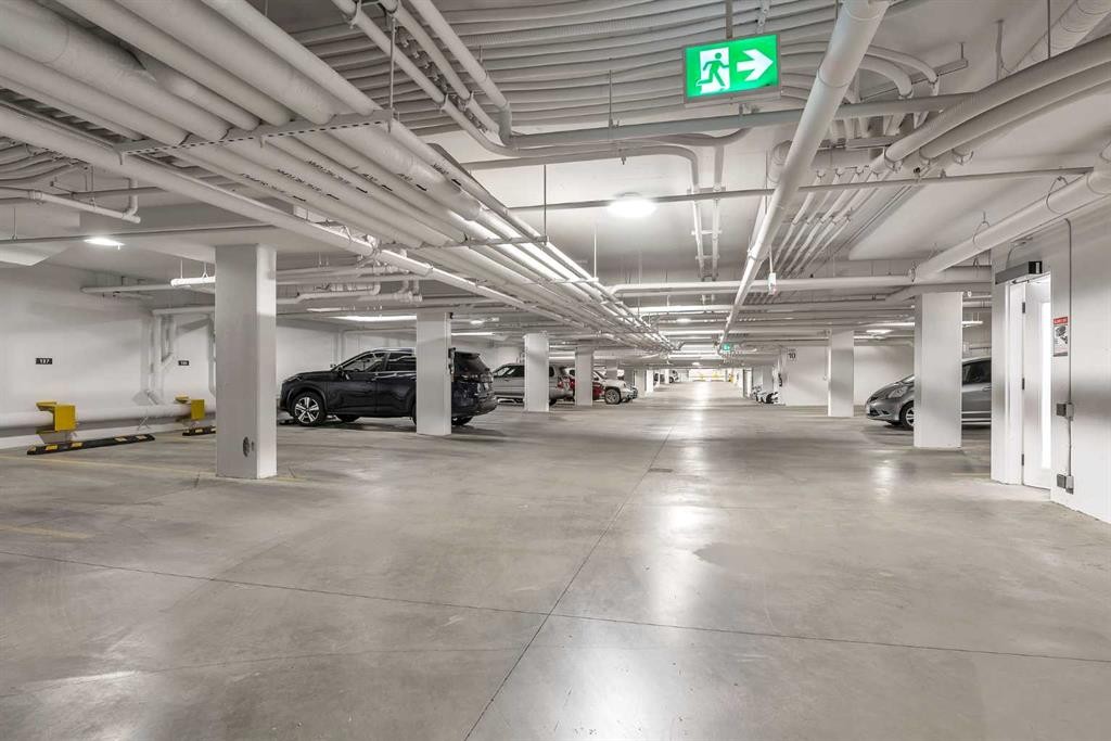 1415-111 Wolf Creek Drive Se, Calgary, AB - Indoor Photo Showing Garage
