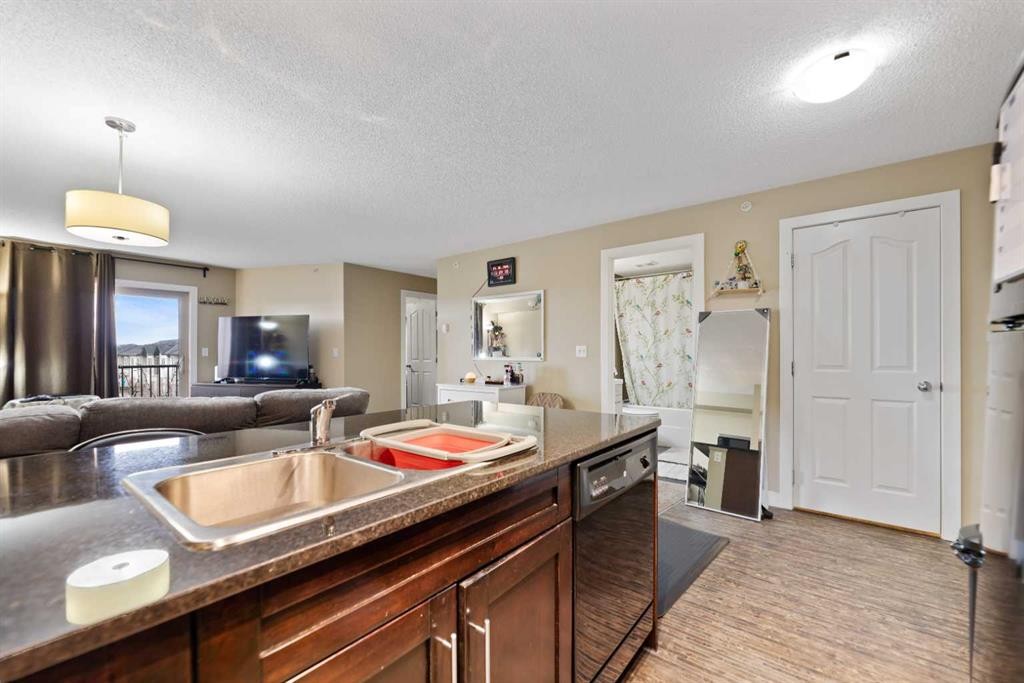 404-355 Taralake Way Ne, Calgary, AB - Indoor Photo Showing Kitchen With Double Sink