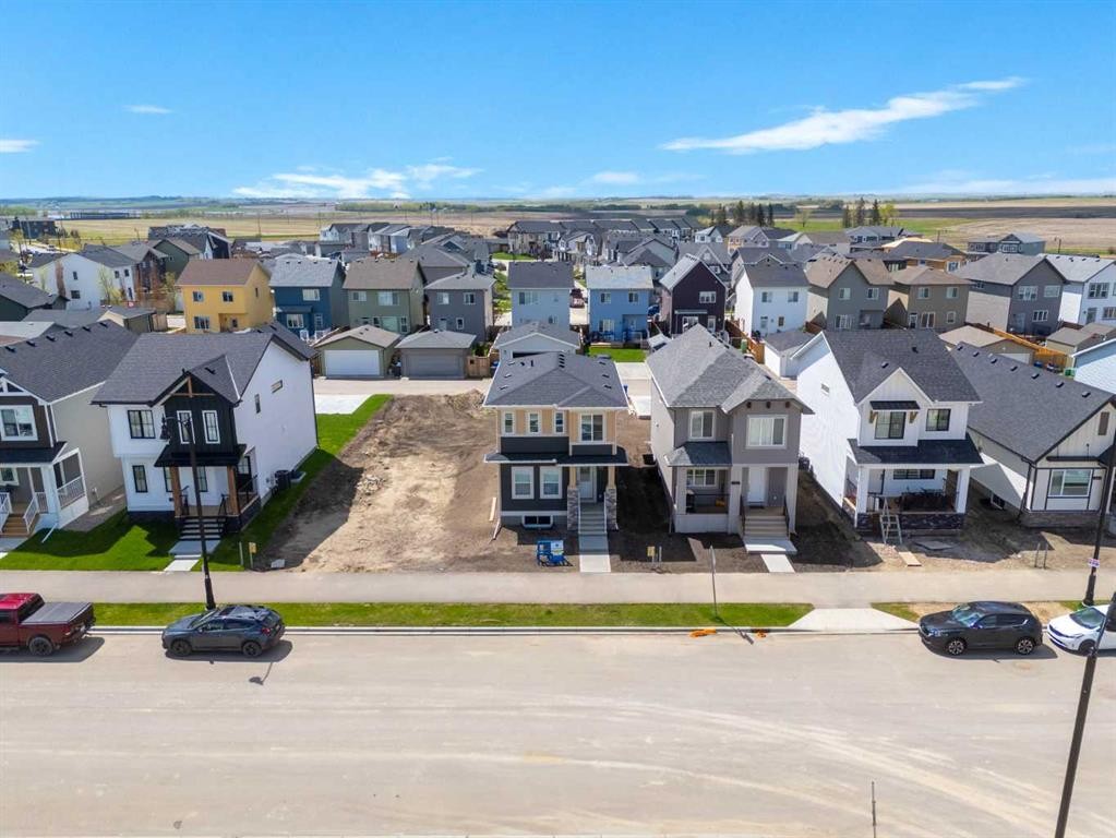 231 Vista Road, Crossfield, AB - Outdoor With Facade