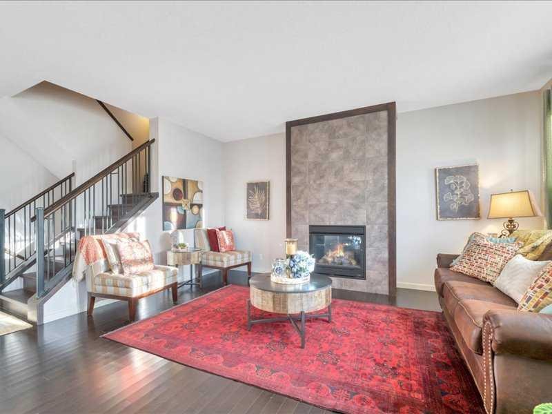 53 Legacy Terrace Se, Calgary, AB - Indoor Photo Showing Living Room With Fireplace