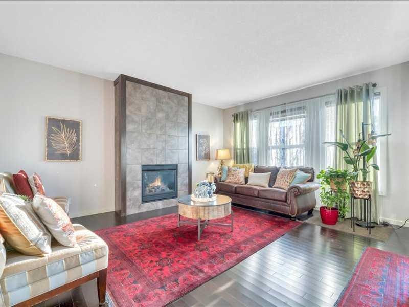 53 Legacy Terrace Se, Calgary, AB - Indoor Photo Showing Living Room With Fireplace