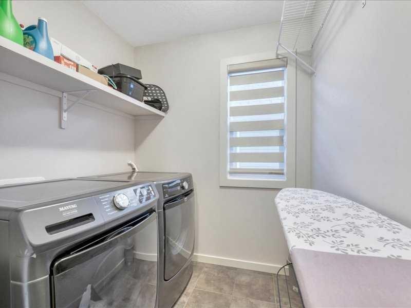 53 Legacy Terrace Se, Calgary, AB - Indoor Photo Showing Laundry Room