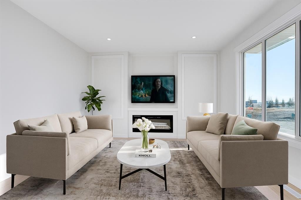 126 Waterstone Way, Chestermere, AB - Indoor Photo Showing Living Room With Fireplace