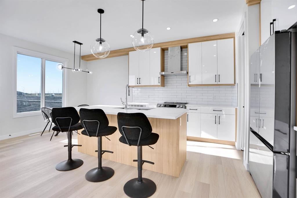 126 Waterstone Way, Chestermere, AB - Indoor Photo Showing Kitchen With Upgraded Kitchen