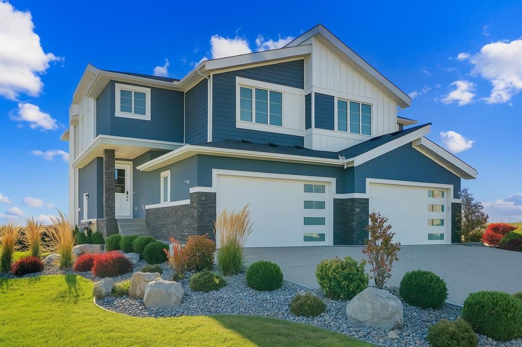 126 Waterstone Way, Chestermere, AB - Outdoor With Facade