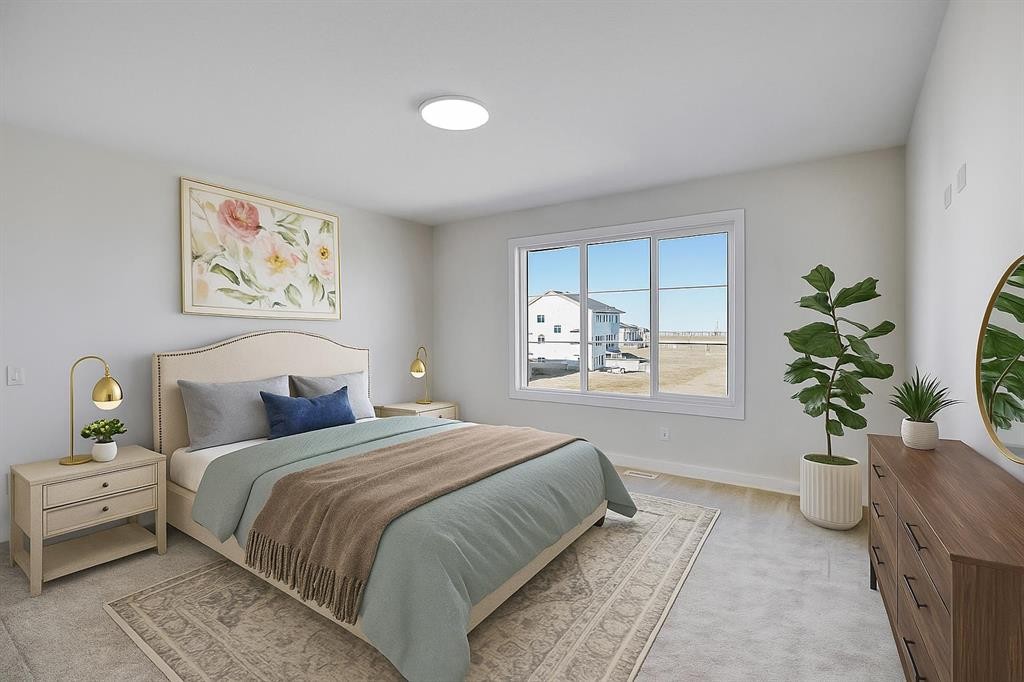 126 Waterstone Way, Chestermere, AB - Indoor Photo Showing Bedroom