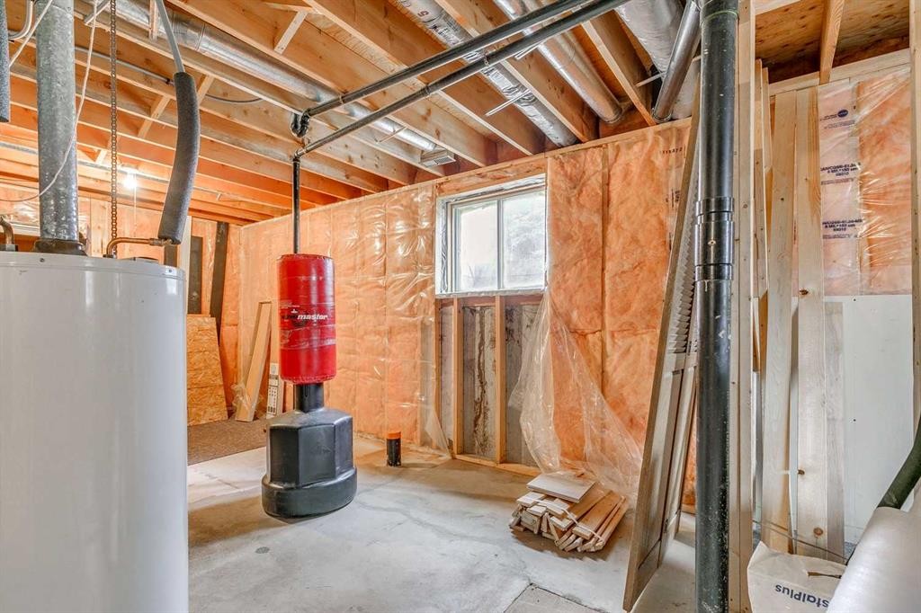 102 1 Avenue, Rural Foothills County, AB - Indoor Photo Showing Basement