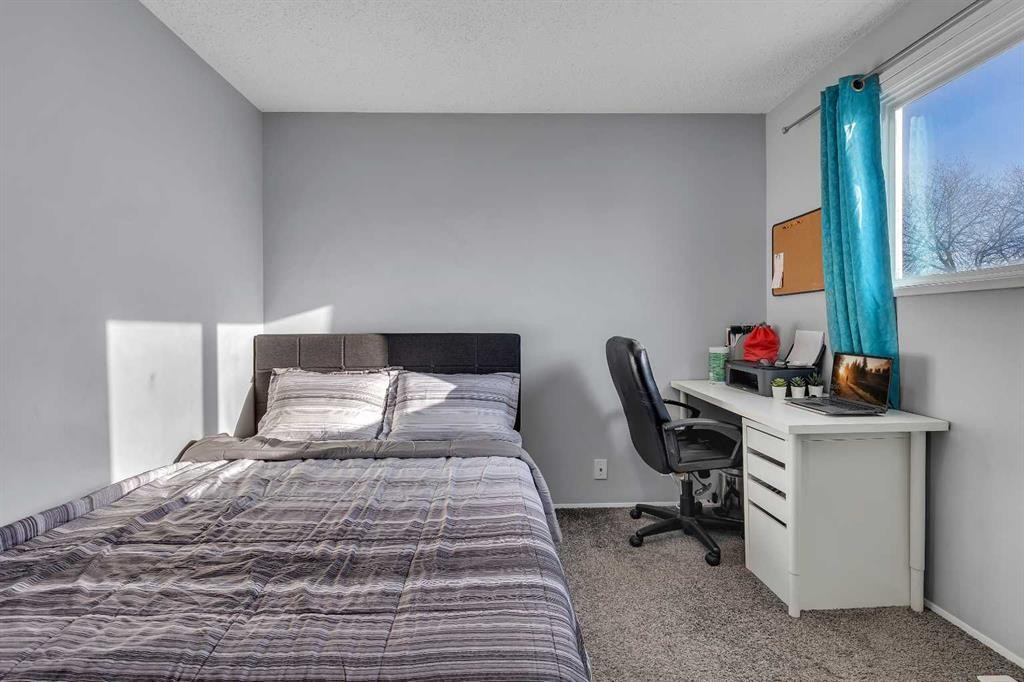 16 Castleglen Crescent Ne, Calgary, AB - Indoor Photo Showing Bedroom