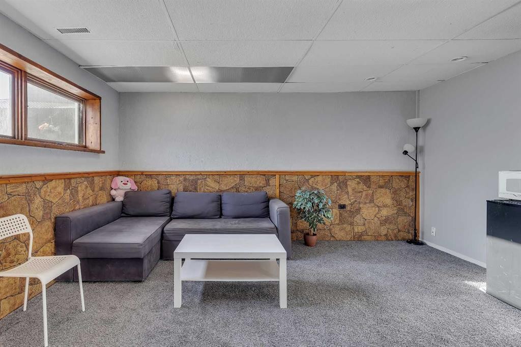 16 Castleglen Crescent Ne, Calgary, AB - Indoor Photo Showing Other Room With Fireplace