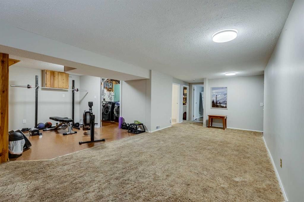 3235 Bearspaw Drive Nw, Calgary, AB - Indoor Photo Showing Gym Room