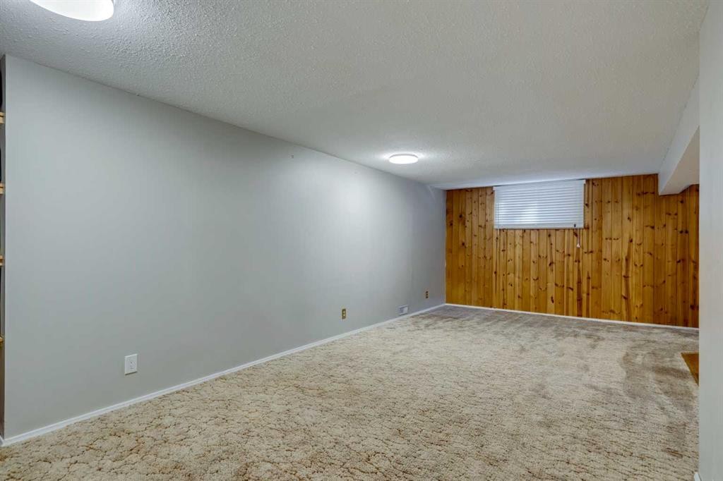 3235 Bearspaw Drive Nw, Calgary, AB - Indoor Photo Showing Basement
