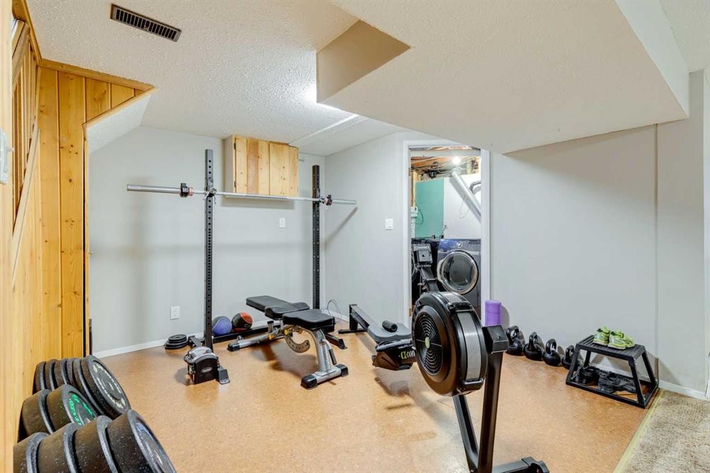 3235 Bearspaw Drive Nw, Calgary, AB - Indoor Photo Showing Gym Room
