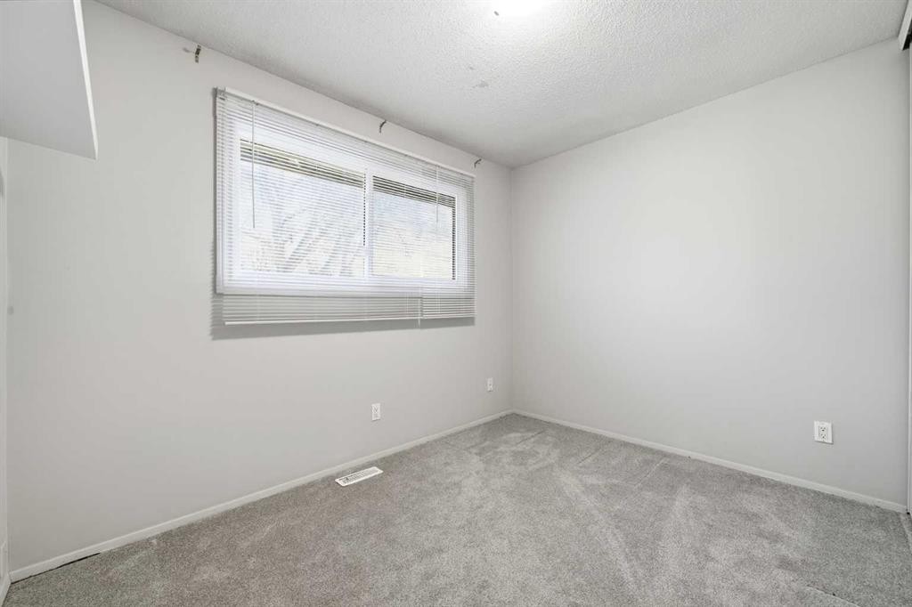 306-2200 Woodview Drive Sw, Calgary, AB - Indoor Photo Showing Other Room