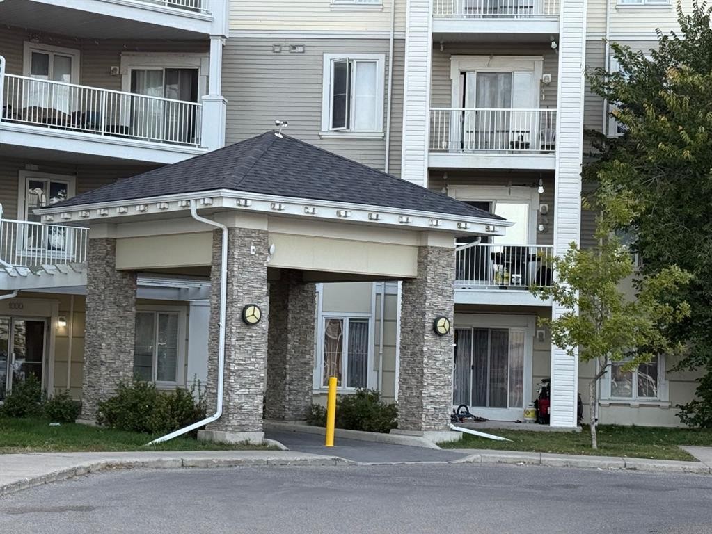 1319-1140 Taradale Drive Ne, Calgary, AB - Outdoor With Balcony With Facade