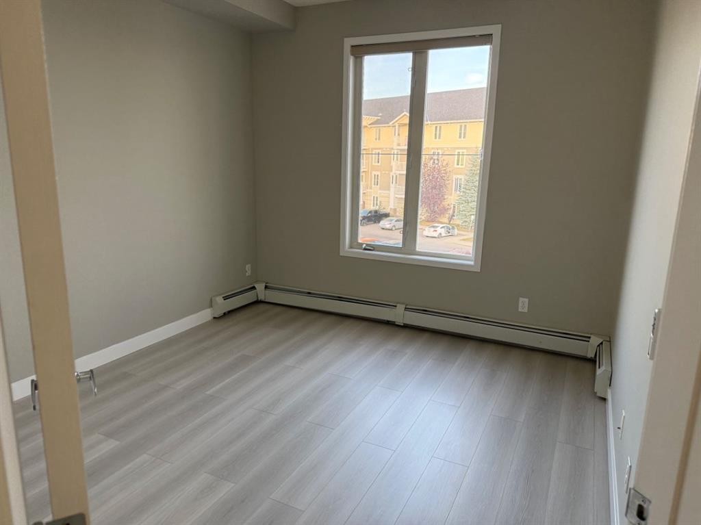 1319-1140 Taradale Drive Ne, Calgary, AB - Indoor Photo Showing Other Room