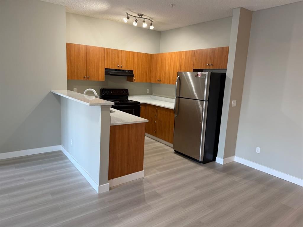1319-1140 Taradale Drive Ne, Calgary, AB - Indoor Photo Showing Kitchen