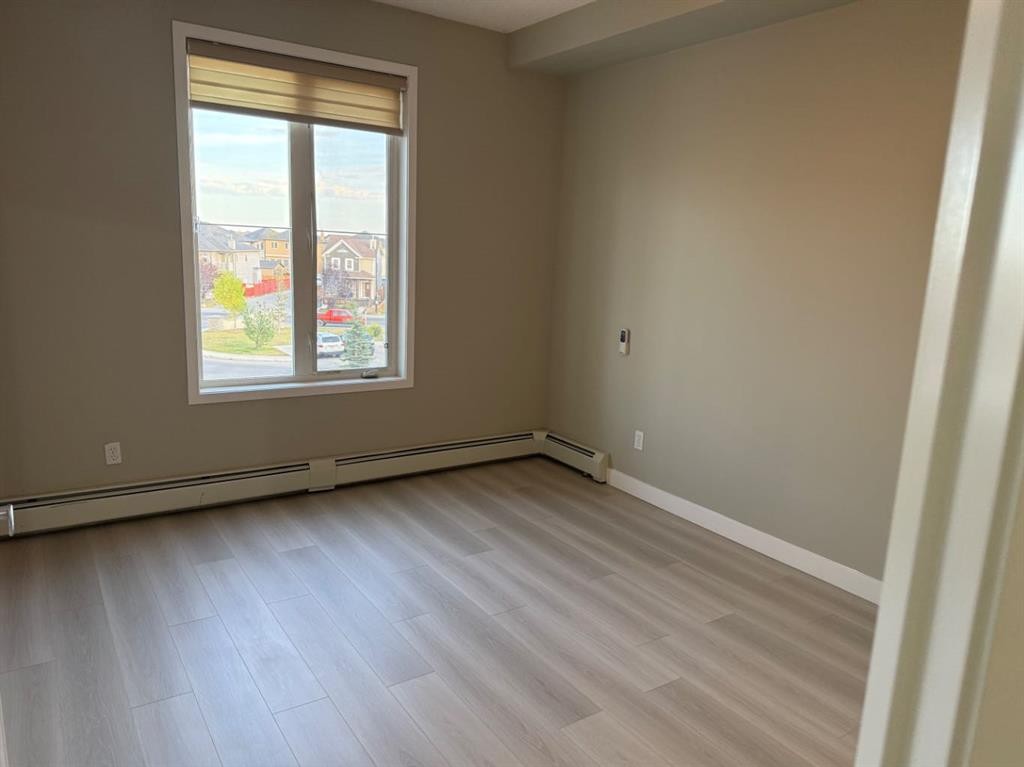 1319-1140 Taradale Drive Ne, Calgary, AB - Indoor Photo Showing Other Room